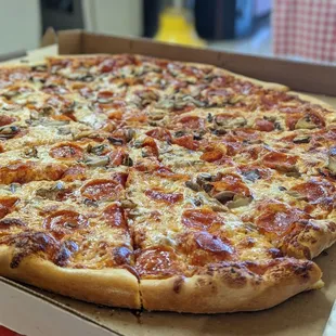 Family size 22" pizza pepperoni and cheese with mushrooms.