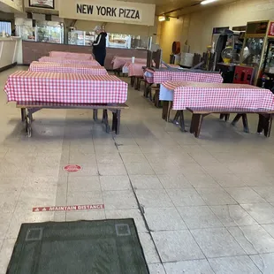 tables with red and white checkered tablecloths