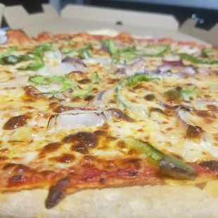 Spicy cheese with bell peppers and onions! Nobody does it better.