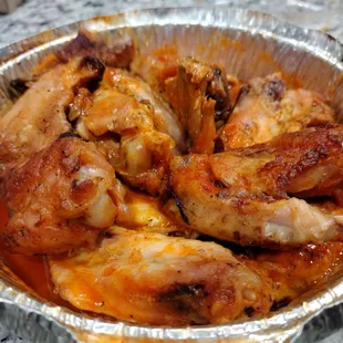Barely cooked chicken wings in watered down sauce! Smelled more like boiled chicken, than hot wings.