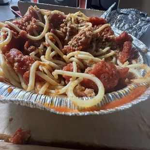 Spaghetti was lacking salt and looked like a kid made it ! .  and pizza was bad too! No flavor nothing .