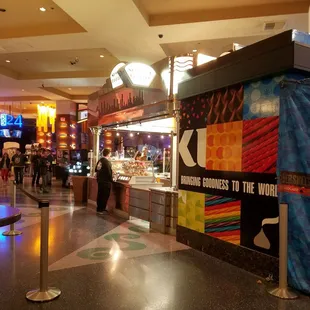 Located in the upper level of New York - New York near the MGM Grand pedestrian bridge.