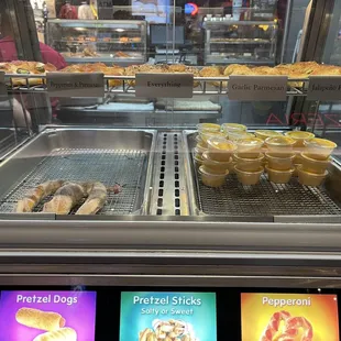 a variety of pastries in a display case