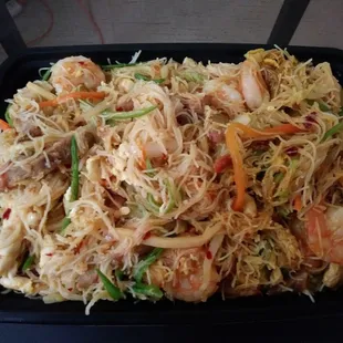 Mei fun. Singapore noodles with pork and shrimp