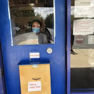 COVID door for takeout. No one gets inside.