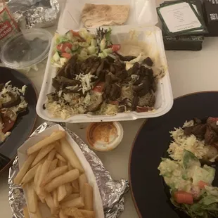 Lamb shawarma plate with dolmatoes side dish and some quarantine games.