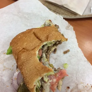 a half eaten sandwich