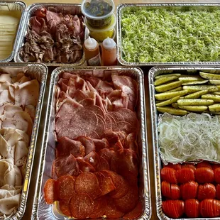 trays of meat and vegetables
