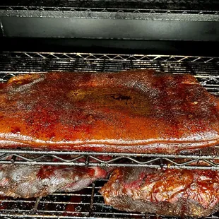 the meat being cooked in the oven