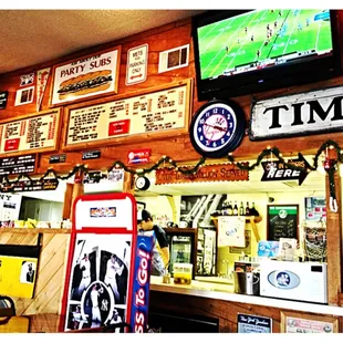 a wall of sports memorabilia