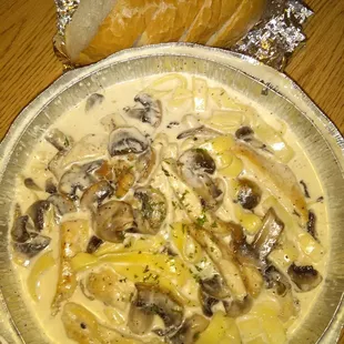 Chicken alfredo with mushrooms very very good $13.00. I couldnt eat it all so the price was worth dinner for 2 days.