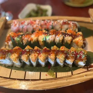 a plate of sushi rolls