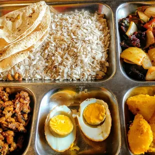 This newari kaja platter was so fun to try ! My favorites were the crispy papadum, and the meat&amp;onions!