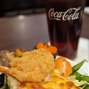 a plate of food and a drink