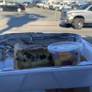 Spinach quiche with a side of fruit