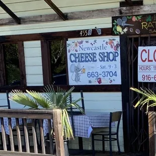 closed sign on the front of the shop