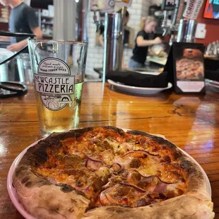 Sausage onion pizza &amp; cider