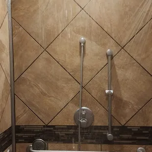 a shower head and hand held shower head