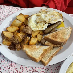 Eggs, sausage, toast, home fries