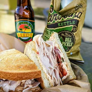 a turkey sandwich and a bag of chips