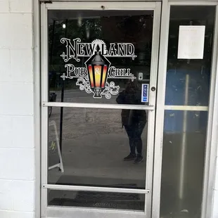 a man standing in front of the door