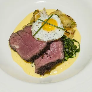Grilled Petit Filet Mignon, Fried Quail Egg, Red Potato Gnocchi, Sauteed Chard, Hollandaise