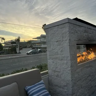 a fireplace on a patio