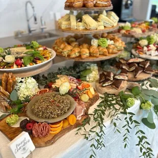 Small sandwiches and charcuterie spread at the Open House event