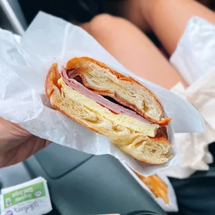 Croissant sandwich w/ bacon, ham &amp; egg