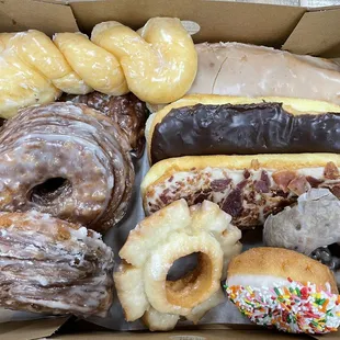a variety of doughnuts in a box