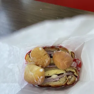 Bonus with 3 mini glazed donut's included  Along with the Bacon, Ham, cheese, egg, croissant.