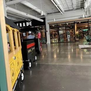 Train going through mall area