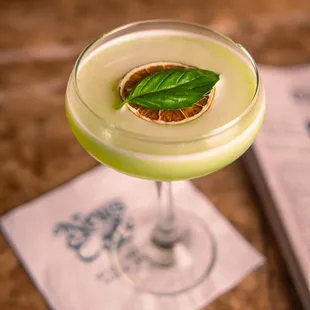 KIWILICIOUS: Herradura Tequila, Kiwi, Lime Juice Thai Basil &amp; Citrus Reduction