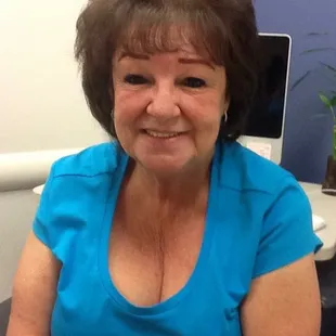 a woman in a blue shirt