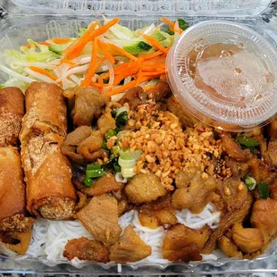 Pork and egg roll vermicelli noodle bowl with fish sauce