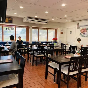 a woman sitting at a table