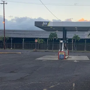a gas station in a parking lot