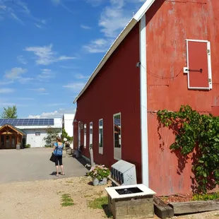 a red building with a white trim
