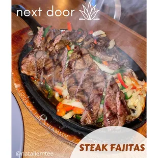 steak fajitas being cooked in a skillet