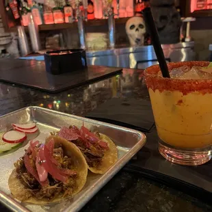 Two tacos and mango margarita