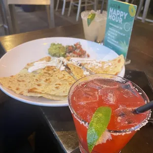 Strawberry margarita (happy hour) and chicken quesadilla (happy hour)