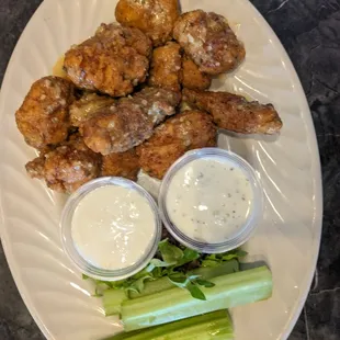 Boneless chicken wings, Parmesan cheese and garlic