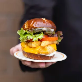 a man holding a plate of food