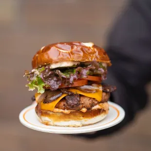 a man holding a plate of food