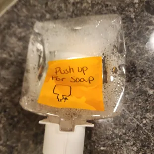 The women's restroom was out of soap, the solution was to have everyone use this broken dispenser. Gross.