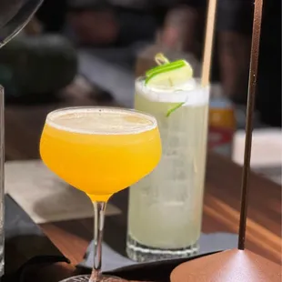 two cocktails on a table