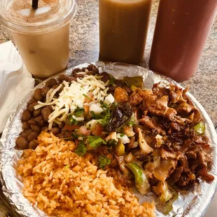 Neza's alambre! Delicious and famous plate.krispybecon grilled steak .onions and green pepper melted cheese picó rice and beans