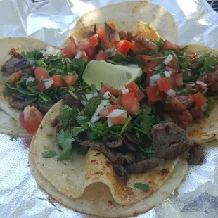 2 steak tacos, 2 al pastor. Holy delicious. Best taco al pastor had in a long time.