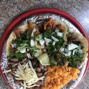 Combó plate! Three tacos. Rice and beans ! Choice chicken pork or steak