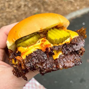 Double with cheese, chili and pickles